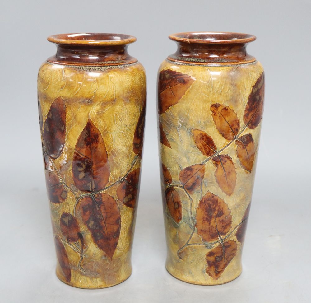 A pair of Doulton stoneware vases